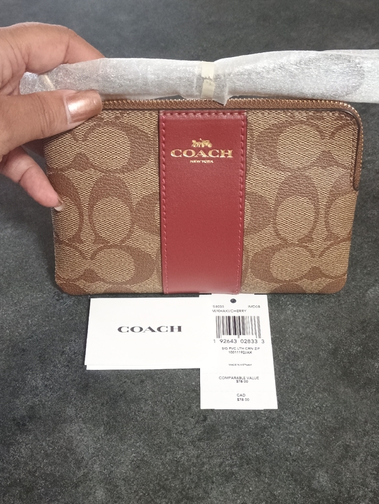 Coach Handbags - Coach Brown Signature Canvas Wristlet with Burgundy Trim